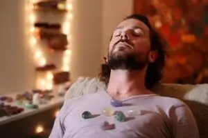 vecteezy_man-during-crystal-healing-session-in-therapy-room-generate-ai_33261899-300x200.jpg